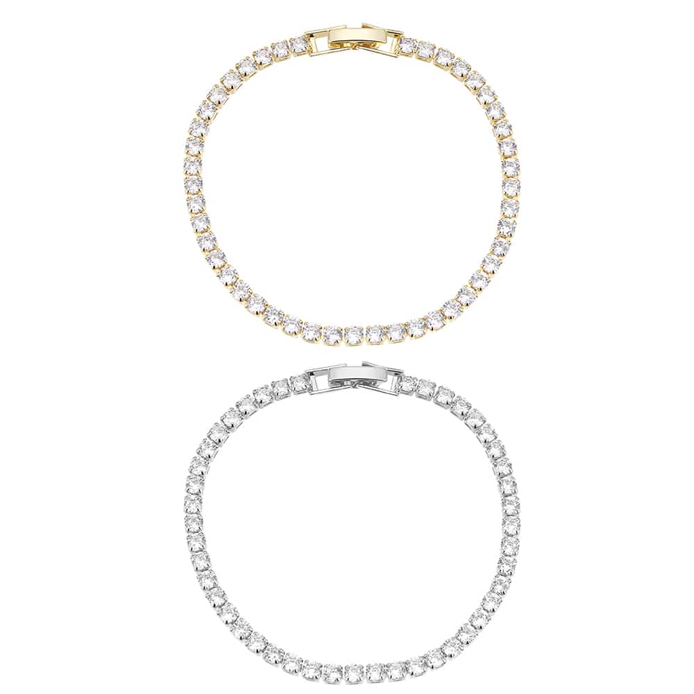 Armbånd, guld- eller sølvfarvet, mange glimtende sten, justerbar