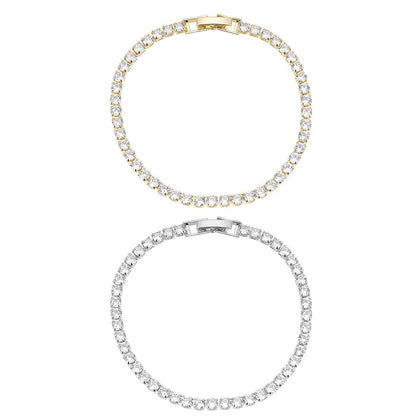 Armbånd, guld- eller sølvfarvet, mange glimtende sten, justerbar