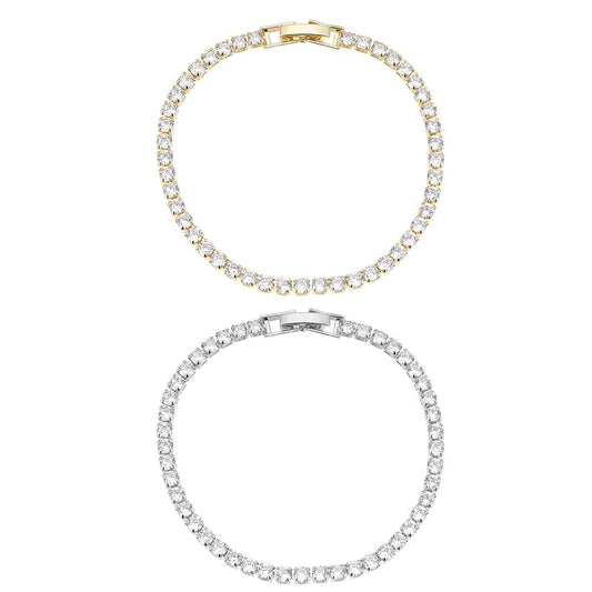 Armbånd, guld- eller sølvfarvet, mange glimtende sten, justerbar
