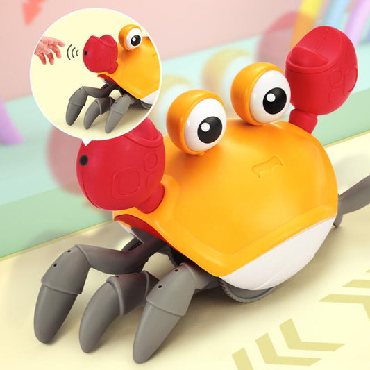 Legetøj til babyer på satana.dk – Glad Baby Krabbe, interaktivt og stimulerende legetøj med musik.