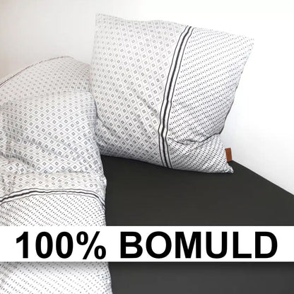 Lækker dyne og pude af 100 procent bomuld.