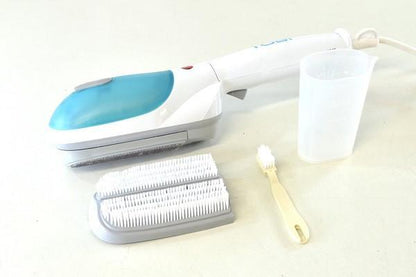 Håndholdt damprenser til tøj &amp; tekstiler