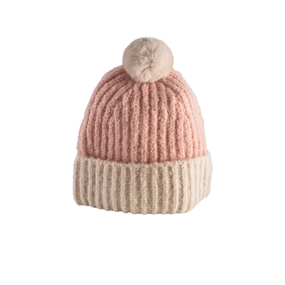 Trendy strikhue med kvast og foldekant